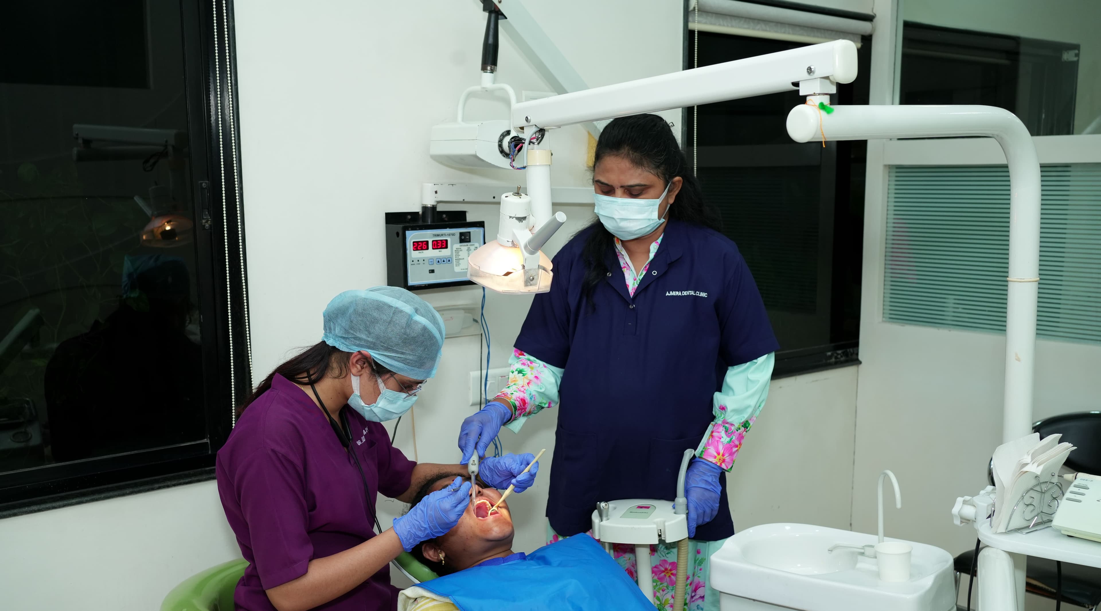 Ajmera Dental Clinic slide 1